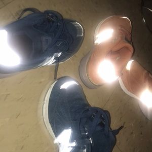 Two pear’s of new balance sneakers blue and orange size 2 USA kids